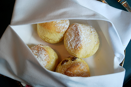 Scones served in a cloth napkin to keep them both warm and moist.