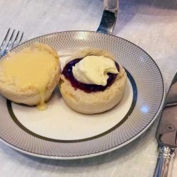 Plain and raisin scones served with Cornish clotted cream, strawberry jam and lemon curd