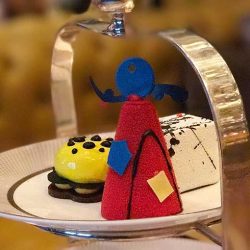 A selection of five miniature gateaux inspired by famous artists