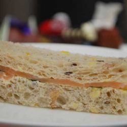 Smoked salmon, tomato. Capers and crème fraiche finger sandwich