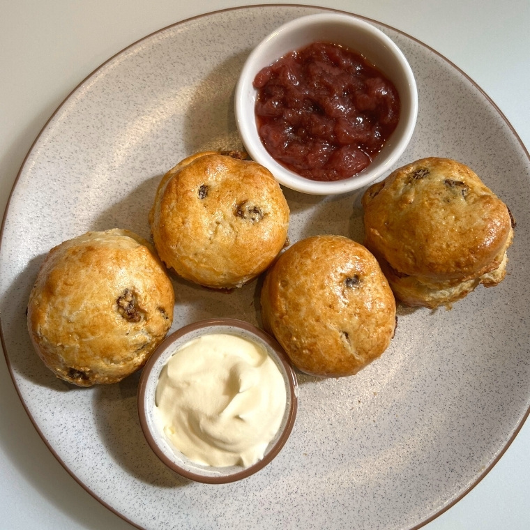 Warm scones with jam and cream