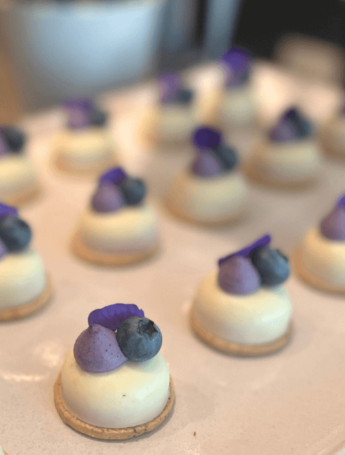 Vanilla cheesecake with blueberry lime confit and lemon myrtle sable