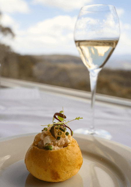 Savoury item & a glass of Louis Roederer champagne