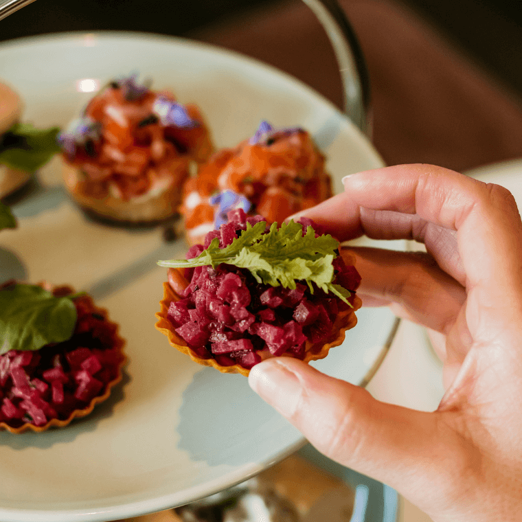 Beetroot tartlet, macadamia cheese, grape, smoked honey